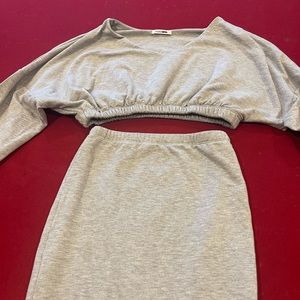 Grey piece set, skirt and sweater.